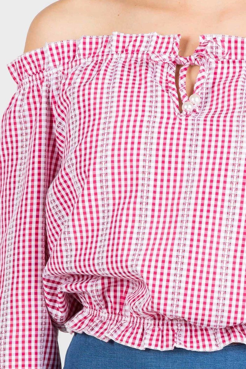 a close up of a pink shirt with a pink shirt 