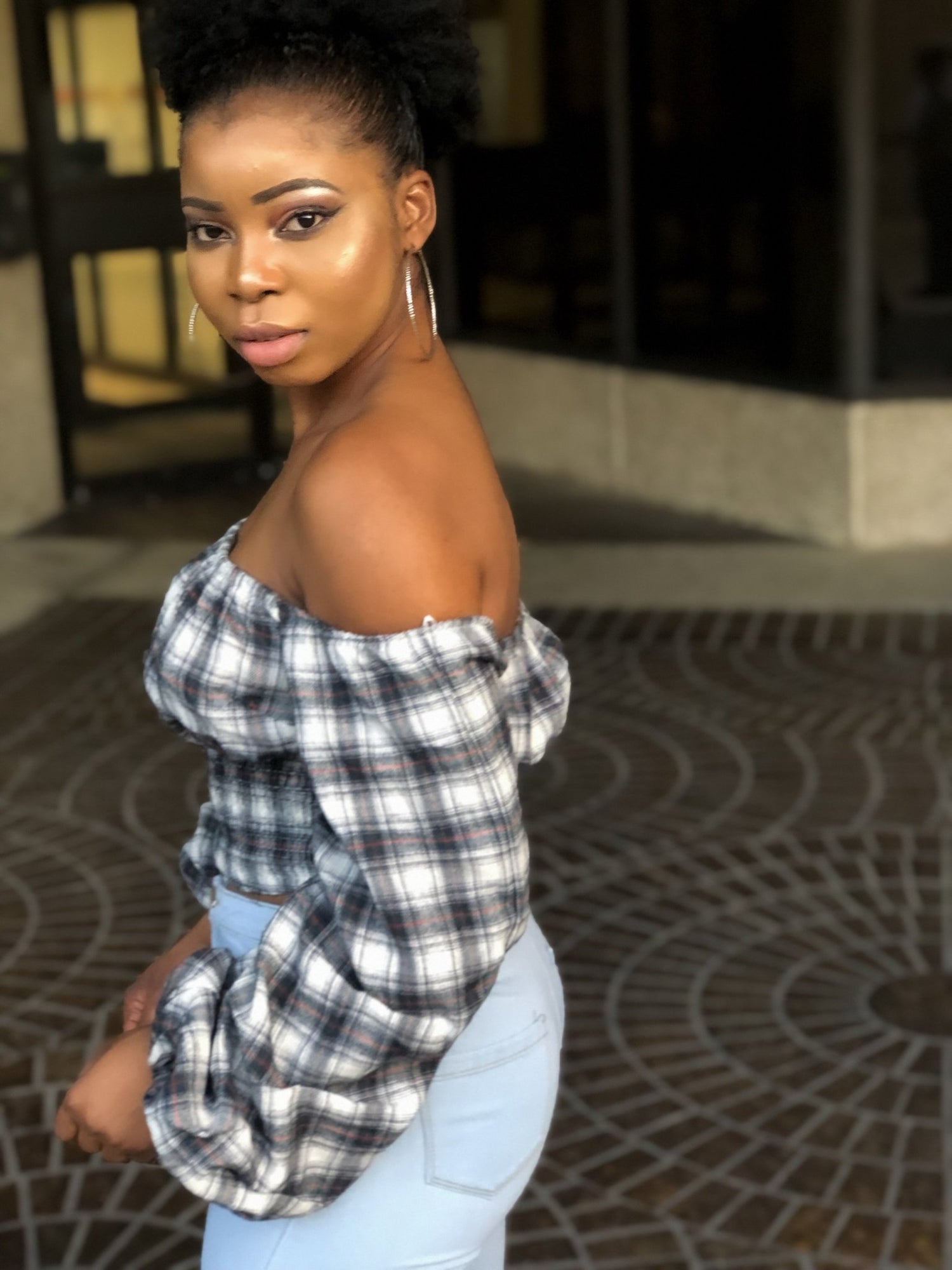 a woman is posing for a picture 